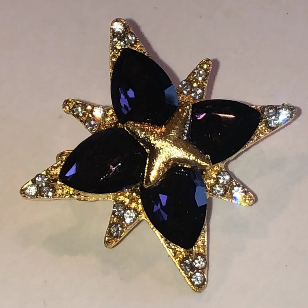 Elegant Gold Tone Purple Starburst Brooch
